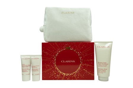 Clarins Body Care Set: Rich Body Lotion 200ml + Hand and Nail Treatment Cream 30ml + Body Scrub 30ml